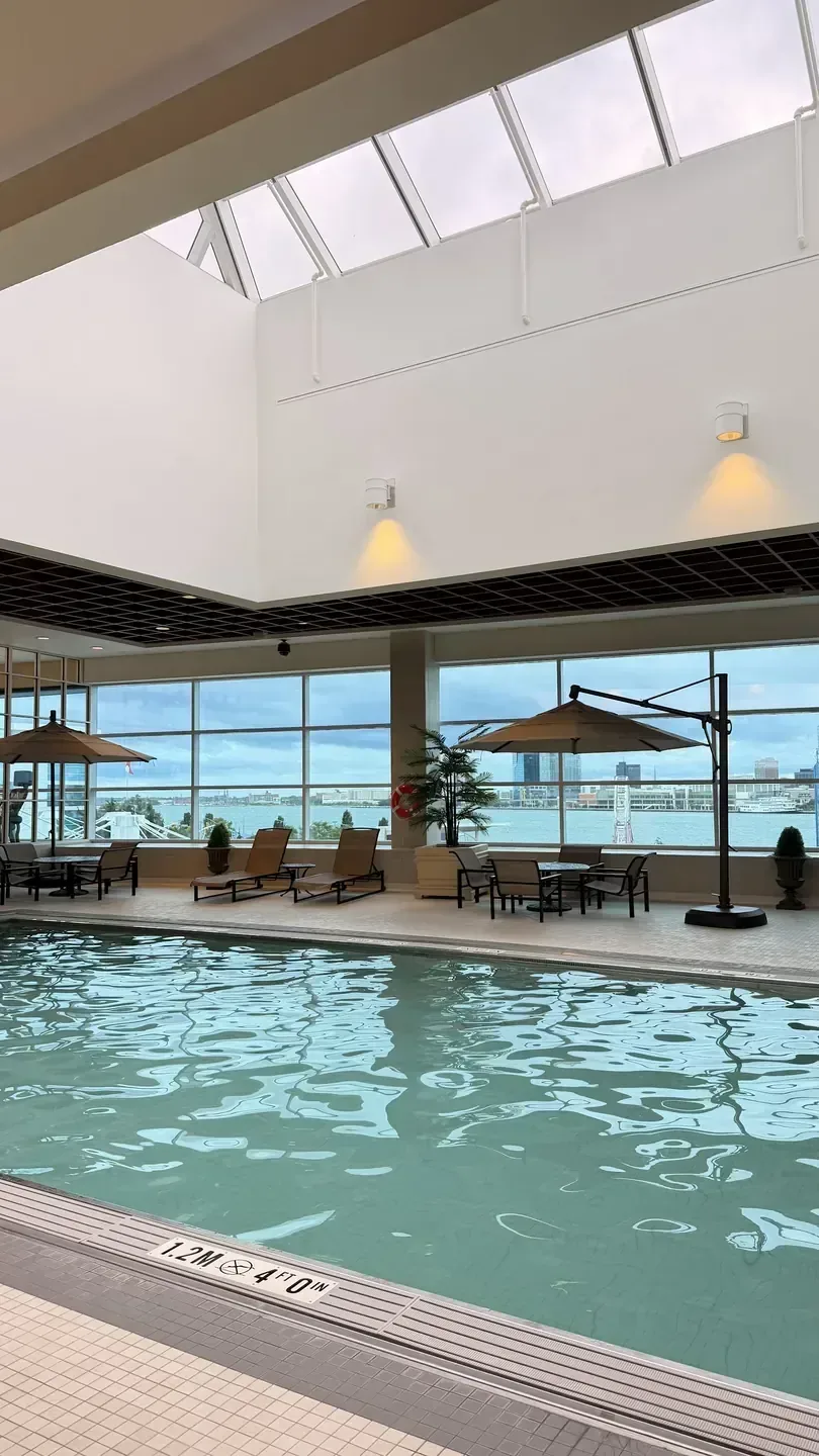 Indoor pool area at Caesars Windsor with a view over the water, Windsor